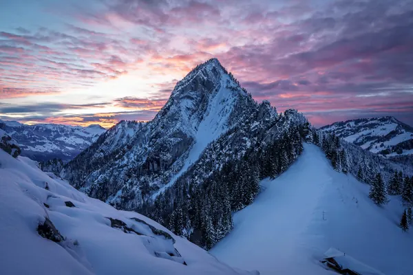 Hoflue im Abendrot – Abendrot über der winterlichen Bergwelt